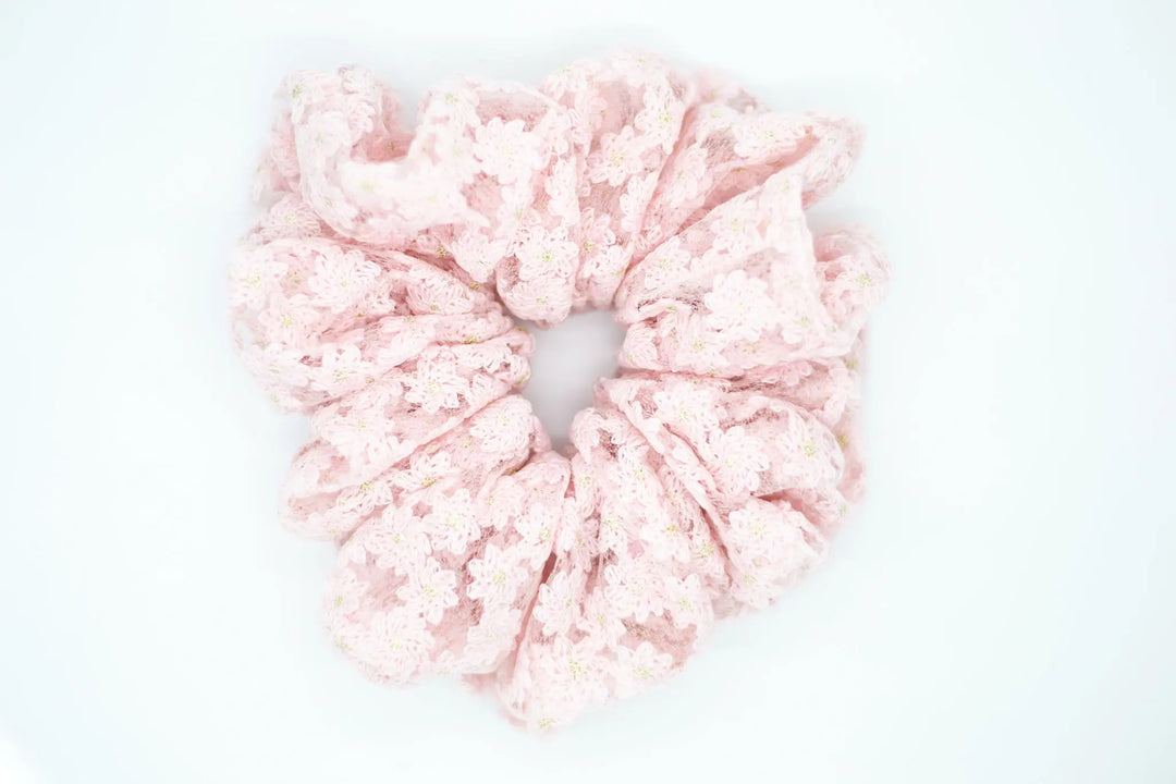 Oversized pink scrunchie with tulle daisy detail