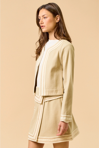 lalavon ILT5820 The Ultimate Colorblock Jacket Woman wearing a beige outfit against a beige background