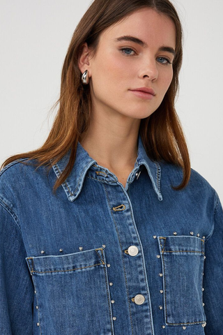 EsQualo SP2612016 Denim Blouse with Studs Woman wearing a blue denim jacket against a white background