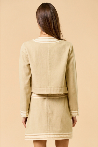 lalavon ILT5820 The Ultimate Colorblock Jacket Woman wearing a beige jacket and skirt set on a beige background