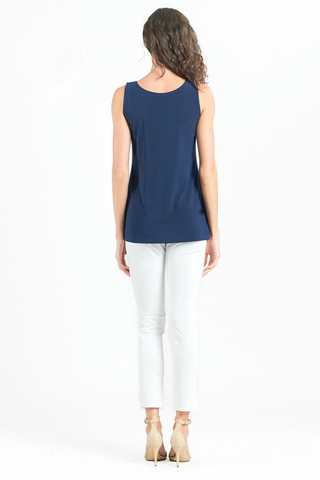 Clara Sunwoo Signature Mid-Length Tank  - Navy TK73 Woman wearing a navy sleeveless top and white pants on a white background