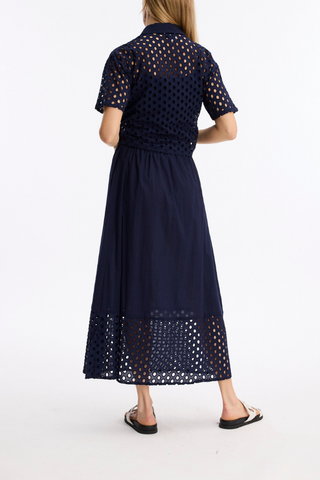 Leo & Ugo JE924 Laura Openwork Short Sleeve Blouse  Navy blue dress with lace detailing on a white background