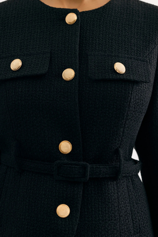 Leo & Ugo KE376 Salomé Elegant Belted Jacket - Black  Black coat with gold buttons on a dark background