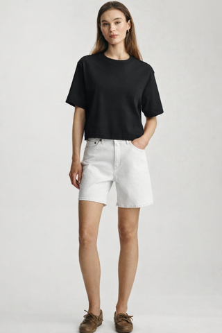 Mavi M1613686-900 Riley Crew Neck T-Shirt  Woman wearing a black t-shirt and white shorts on a plain background