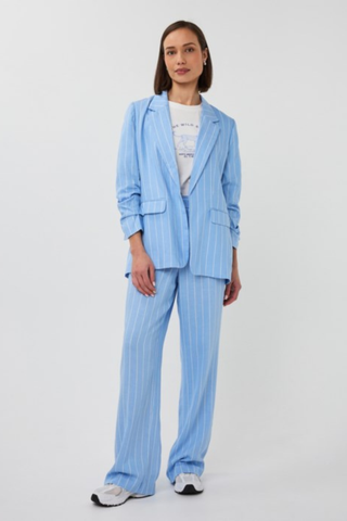 EsQualo SP2628002 Striped Linen Blazer  Woman wearing a light blue striped suit on a white background