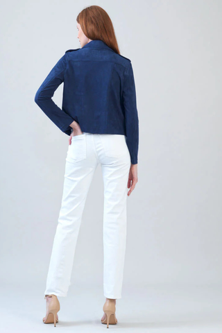 Clara Sunwoo Soft Suede - Architectural Moto Jacket - Navy JK26W Woman wearing a blue jacket and white pants on a light gray background