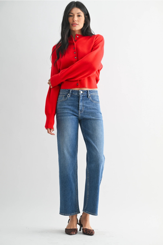 Just Black BP511J The Refined Mid Rise Slim Wide Leg  Woman wearing a red blouse and blue jeans on a white background