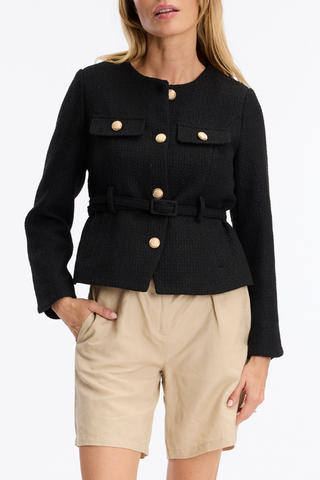 Leo & Ugo KE376 Salomé Elegant Belted Jacket - Black  Woman wearing a black jacket with gold buttons and beige shorts on a white background