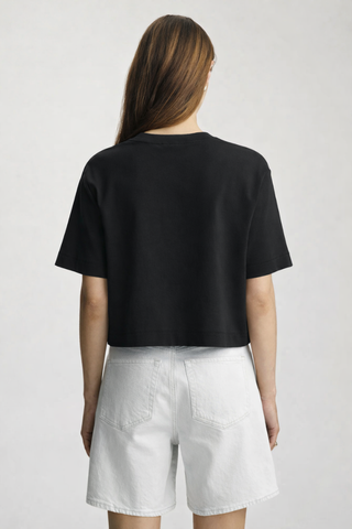 Mavi M1613686-900 Riley Crew Neck T-Shirt  Person wearing a black t-shirt and white shorts on a plain background