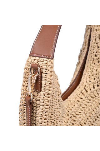 Tallulah Crossbody Moda Luxe Woven handbag with brown handle and strap on a white background