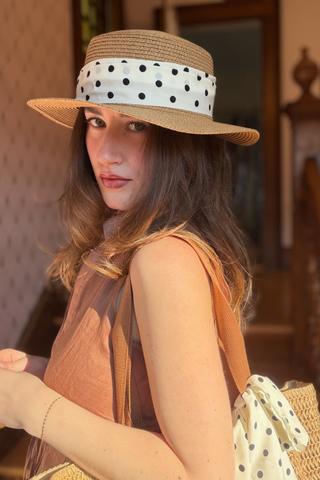 Leo & Ugo KEBH086 Polka Dot Trim Hat & Bag Combo Woman wearing a straw hat with a polka dot band indoors