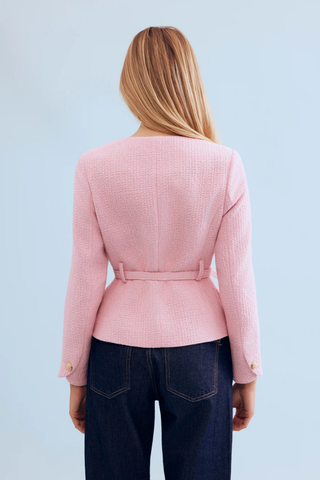 Leo & Ugo KE376 Salomé Elegant Belted Jacket - Pink Person wearing a pink blazer with a light blue background