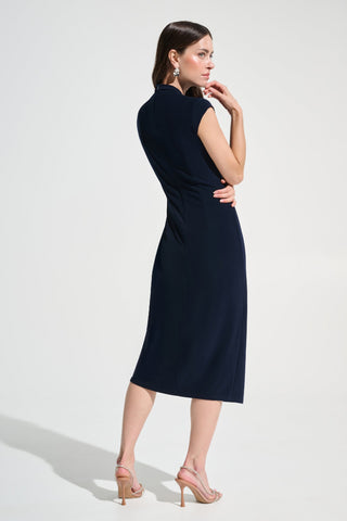 Ribkoff 262715 Signature | Silky Knit Wrap Sheath Dress With Rhinestone Detail Woman wearing a navy blue dress against a white background
