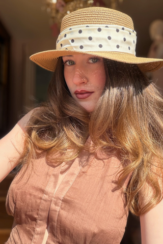 Leo & Ugo KEBH086 Polka Dot Trim Hat & Bag Combo Woman wearing a straw hat with a polka dot band indoors
