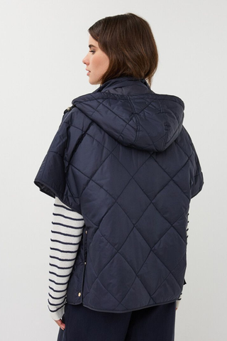 EsQualo SP2637009 Bodywarmer/ Poncho Quilted Woman wearing a navy quilted vest against a white background