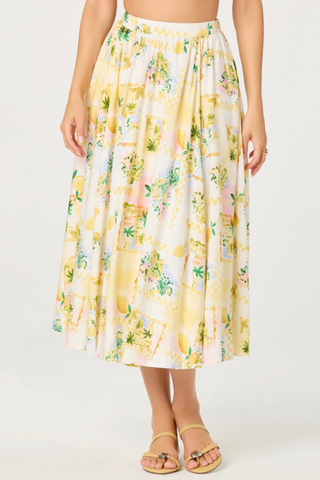 Yellow floral skirt worn by a person on a white background ASTR Kaleigh Skirt