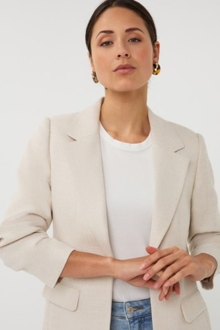 EsQualo SP2610045 Linen Look Blazer Woman wearing a beige blazer over a white shirt with a plain background