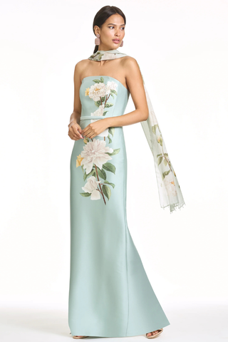 Sachin & Babi  Embellished Sophia Gown - Celadon Floral S263G44-335 Woman wearing a light blue floral dress with a matching scarf on a white background