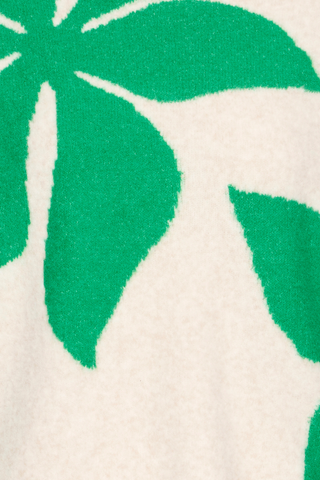 Close-up of a textured fabric with green leaf patterns on a beige background b. young BYOmea Flower Sweater