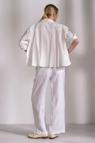 Elan PL11631 Oversized Back Pleated Shirt  Person wearing a white outfit against a plain background