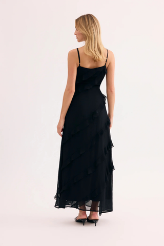 Leo & Ugo KER094 Angelina Black Long Dress with Ruffles Woman wearing a black dress with ruffled layers on a white background