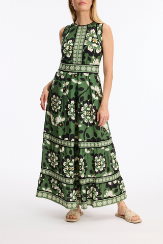 Leo & Ugo KER380 Floral Print Sleeveless Dress Woman wearing a green floral dress on a white background
