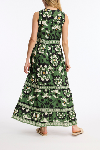 Leo & Ugo KER380 Floral Print Sleeveless Dress Woman wearing a green floral dress on a white background