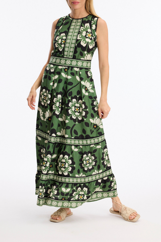 Leo & Ugo KER380 Floral Print Sleeveless Dress Woman wearing a green floral dress on a white background