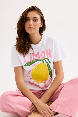 Leo & Ugo TEK074 Lennon Lemon Printed T-Shirt  Woman wearing a white t-shirt with a colorful lemon graphic and text.
