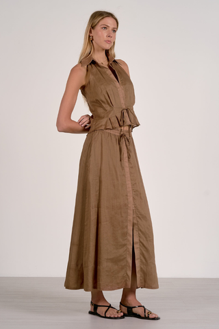 Elan RA11634  Woman wearing a brown sleeveless dress with a belt on a white background