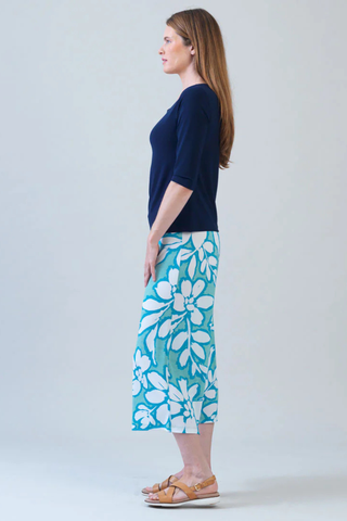 Clara Sunwoo Scoop Neck Half Sleeve Top - Navy T77 Woman wearing a navy top and blue floral skirt on a white background