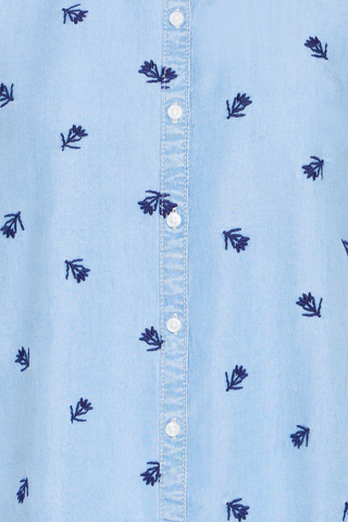 Light blue denim fabric with small dark blue floral patterns and white buttons. b. young BYKosmo Boho Embroidered Shirt