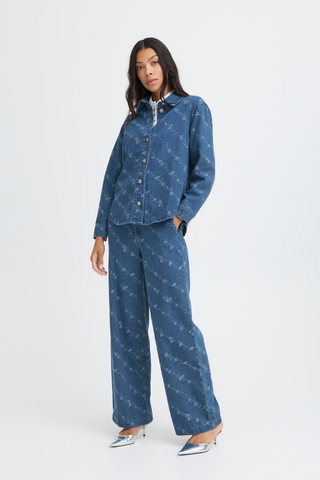 Woman wearing a blue patterned outfit on a white background b. young BYKanio Shirt