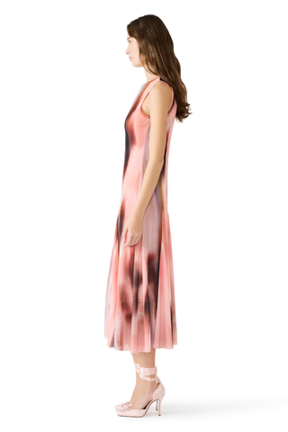 Steve Madden Marenne Dress XP208960 Woman wearing a sleeveless dress with a pink and black tie-dye pattern on a white background