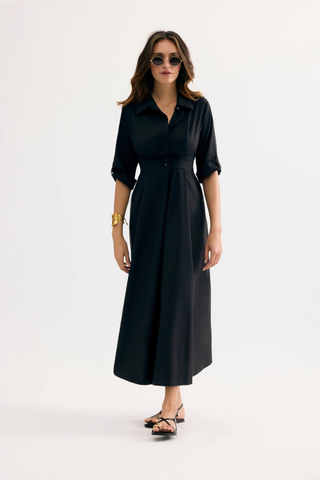 Leo & Ugo EER620 LAETITIA Black Tie-Waist Midi Shirt Dress Woman wearing a black dress on a white background