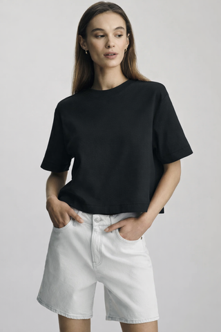 Mavi M1613686-900 Riley Crew Neck T-Shirt  Woman wearing a black t-shirt and white shorts on a plain background