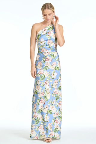 Sachin & Babi Delphine Gown - Twilight Camellias S262G32-494 Woman wearing a floral one-shoulder dress on a white background