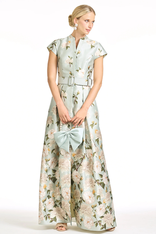 Sachin & Babi Marta Gown - Celadon Sweetbriar Degrade S263G43-335 Woman wearing a floral dress with a bow detail on a white background