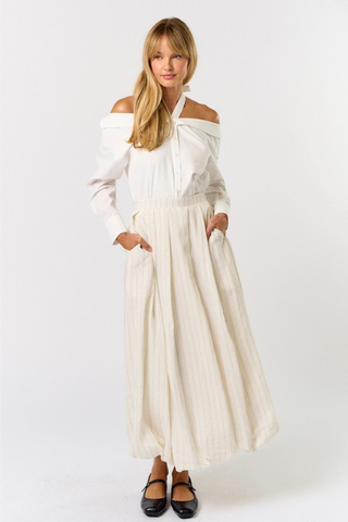lalavon ILK4665 Ivory Pinstripe Bubble Maxi Skirt Woman wearing a white off-shoulder dress on a white background