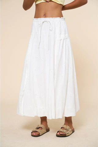lalavon ILK6598 Ivory Eyelet Maxi Skirt Person wearing a white skirt on a beige background
