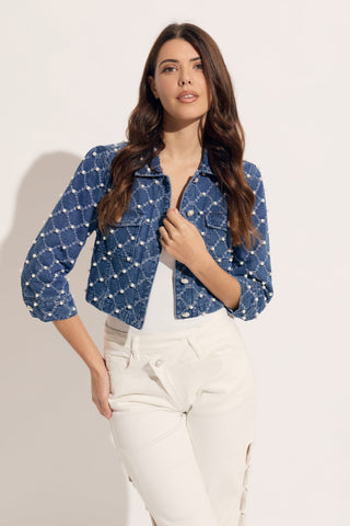 oo la la M1007 Diagonal Denim with Pearl Trim Short Jacket Woman wearing a blue denim jacket with white pattern on a light background