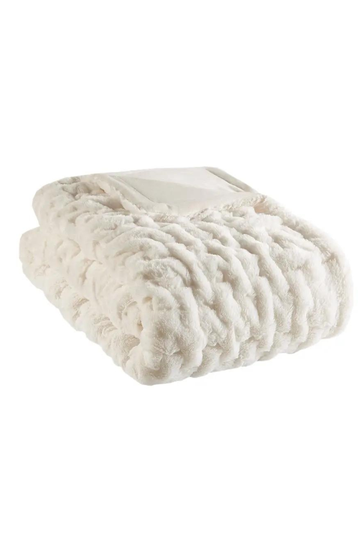 Ivory faux fur throw blanket