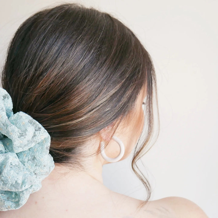 Oversized teal scrunchie with tulle daisy detail